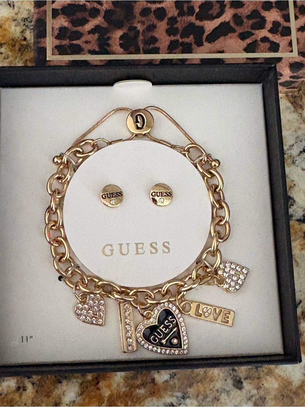 Guess Gold-Tone Charm Bracelet with Crystal Heart Charms